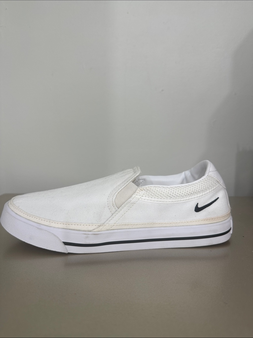 Nike White Slip-On Canvas Loafer with Black Swoosh
